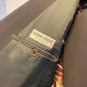 Look sharp and stylish in this classic Armani 2-piece suit, made in Italy.